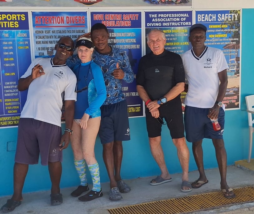 Lifestyle scuba divers in Jamaica with Hugh & Judy group, preparing for a fun underwater adventure.
